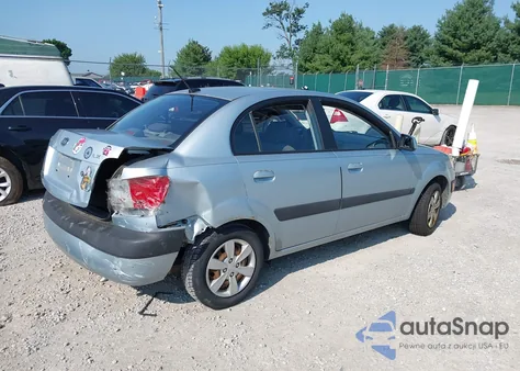 2009 Kia Rio Lx from USA, damaged, VIN KNADE223196444971
